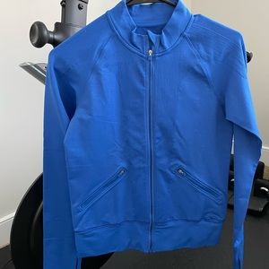 Gorgeous blue Lululemon zip up. Never worn.